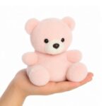 Bailey, a tenyérnyi, ülő, rózsaszín plüss bébi maci, 13 cm (Aurora, Palm Pals)